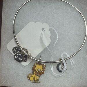 Charming Silver Bangle with Lion Charm